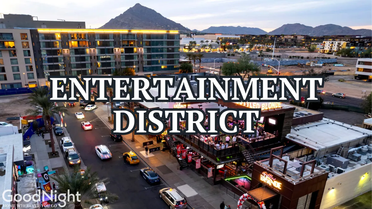 An energetic exterior shot of a prominent entertainment venue in Old Town, framed by city buildings and distant mountains. The scene is alive with cars arriving, suggesting nightlife and lively gatherings, and hints at themed events, live music, and social festivities.